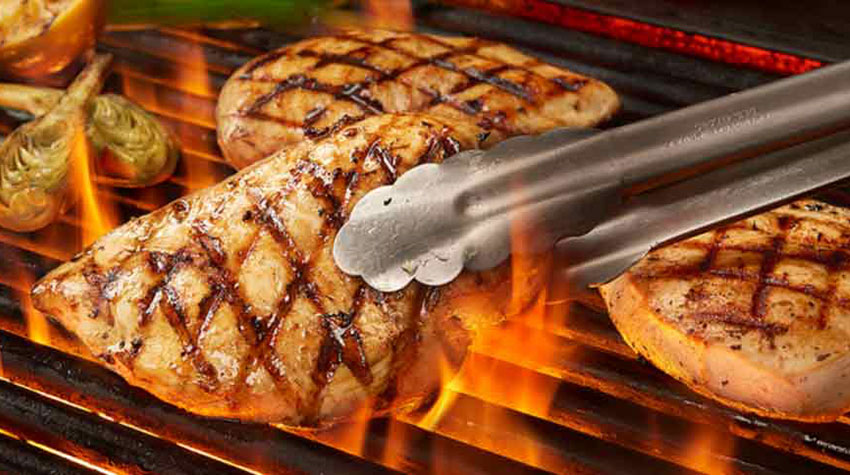 Perdue Harvestland Organic Skinless Chicken Breast being grilled